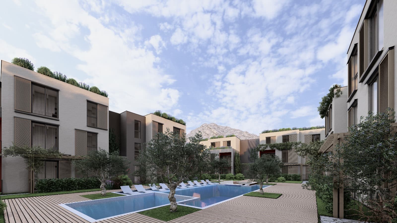 Dvoriste Palm City kompleksa sa bazenom i uredjenim zgradama