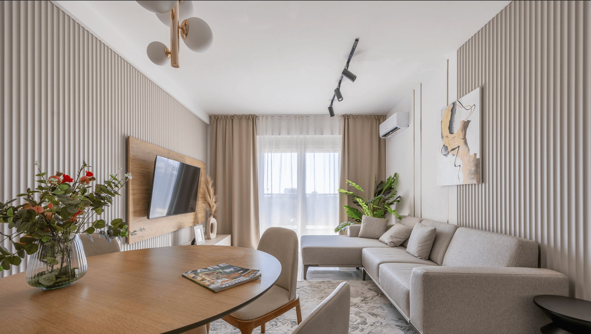 Living and dining room in the Emerald Residence showroom
